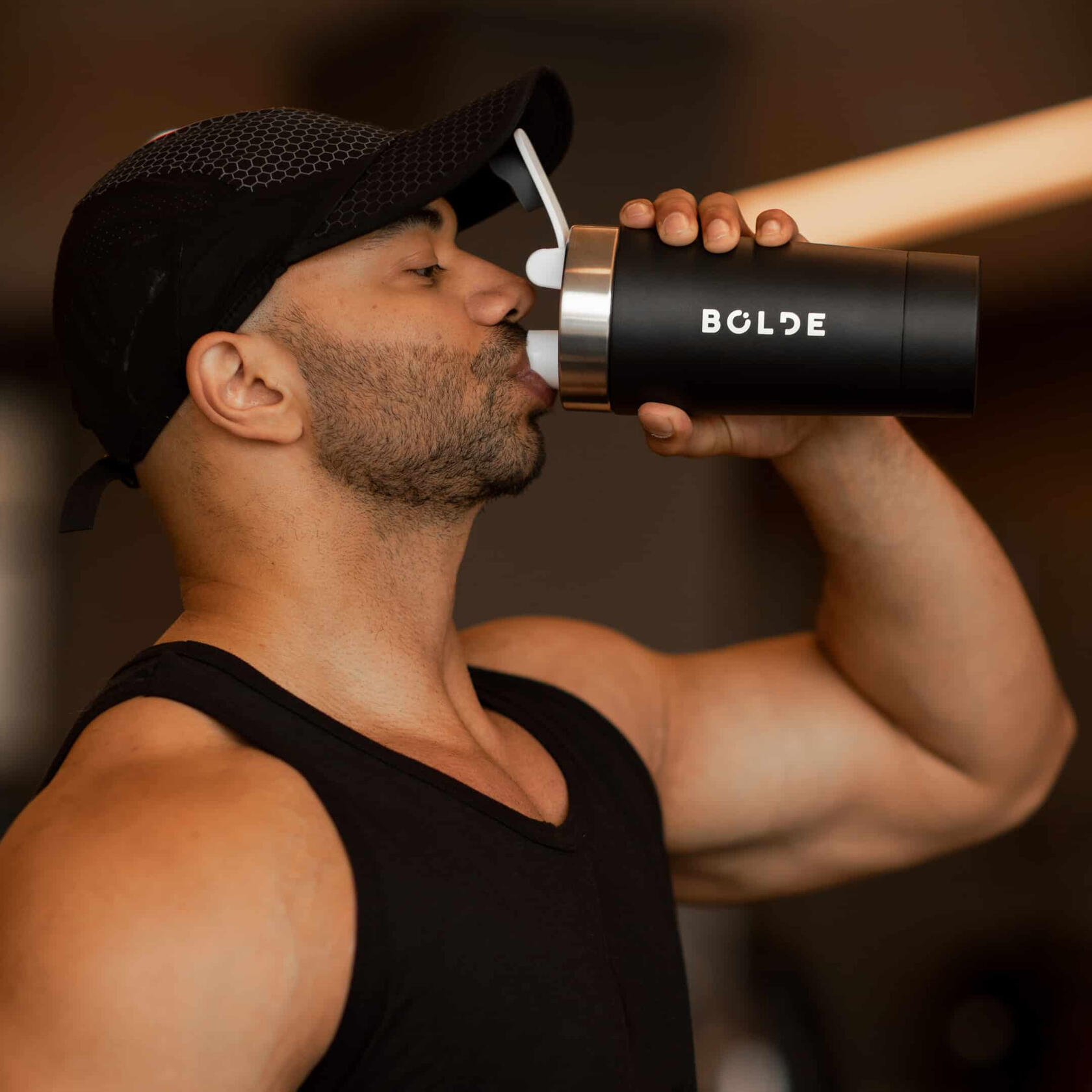 Man drinking from BOLDE Bottle The Best Protein Shaker